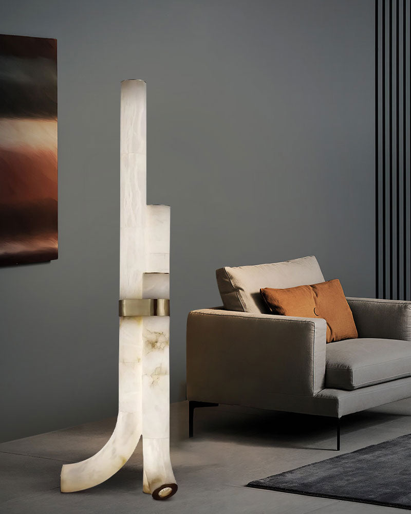 Sculptural alabaster floor lamp with geometric shape and brass accent
