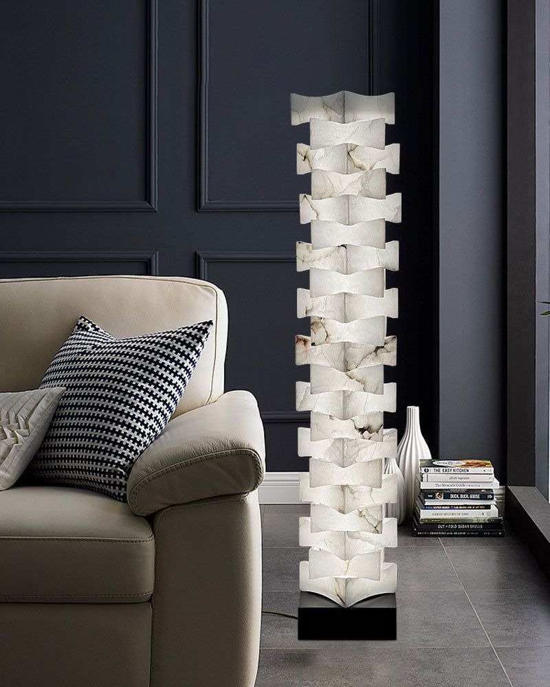 Stylish LED floor lamp with alabaster marble shade illuminating modern living room