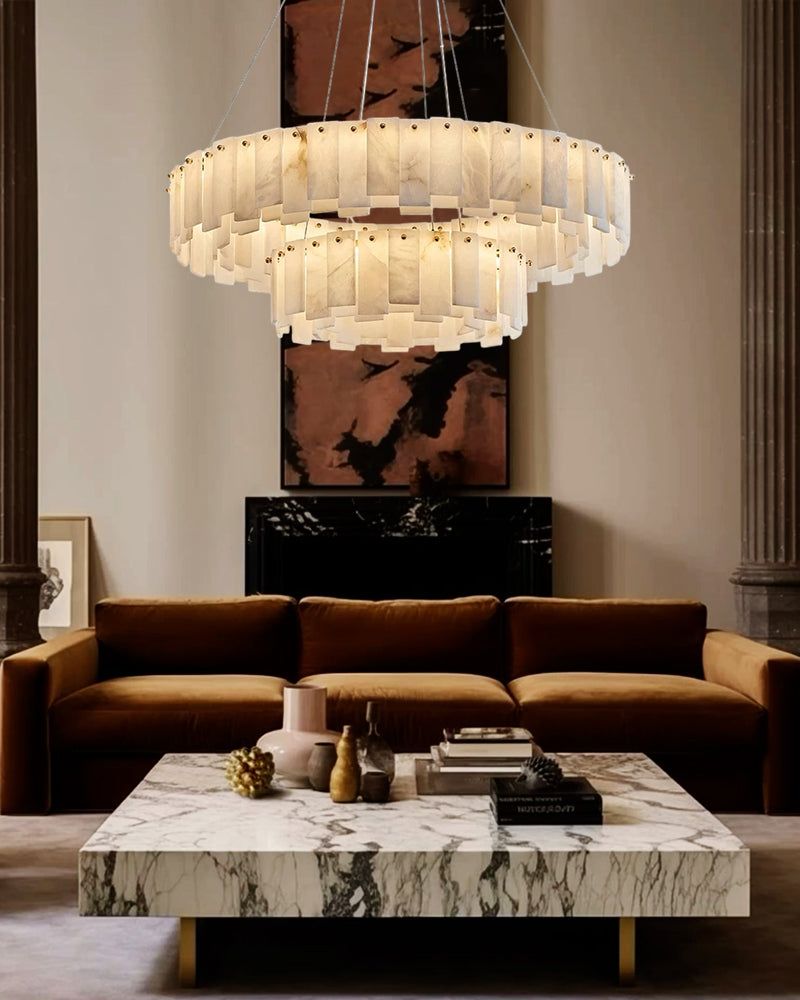 Stylish bedroom with modern white marble ceiling light and gray marble accent wall