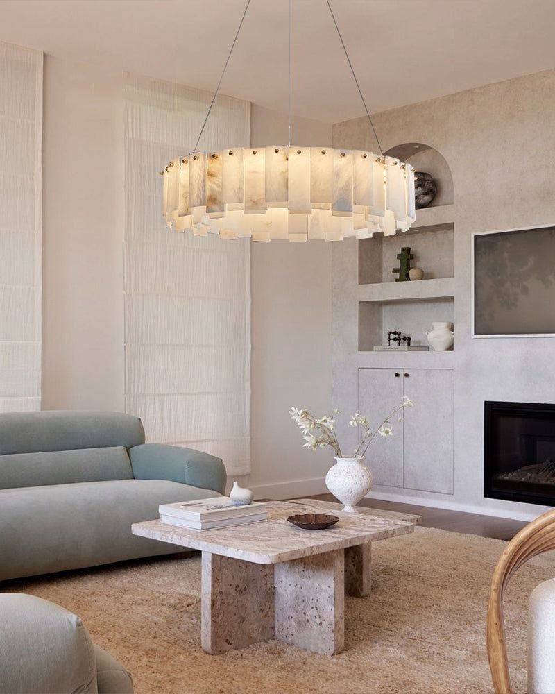 Stylish bedroom with modern white marble ceiling light and neutral decor