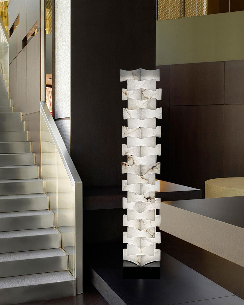 Unique LED floor lamp with alabaster marble shade in modern home interior