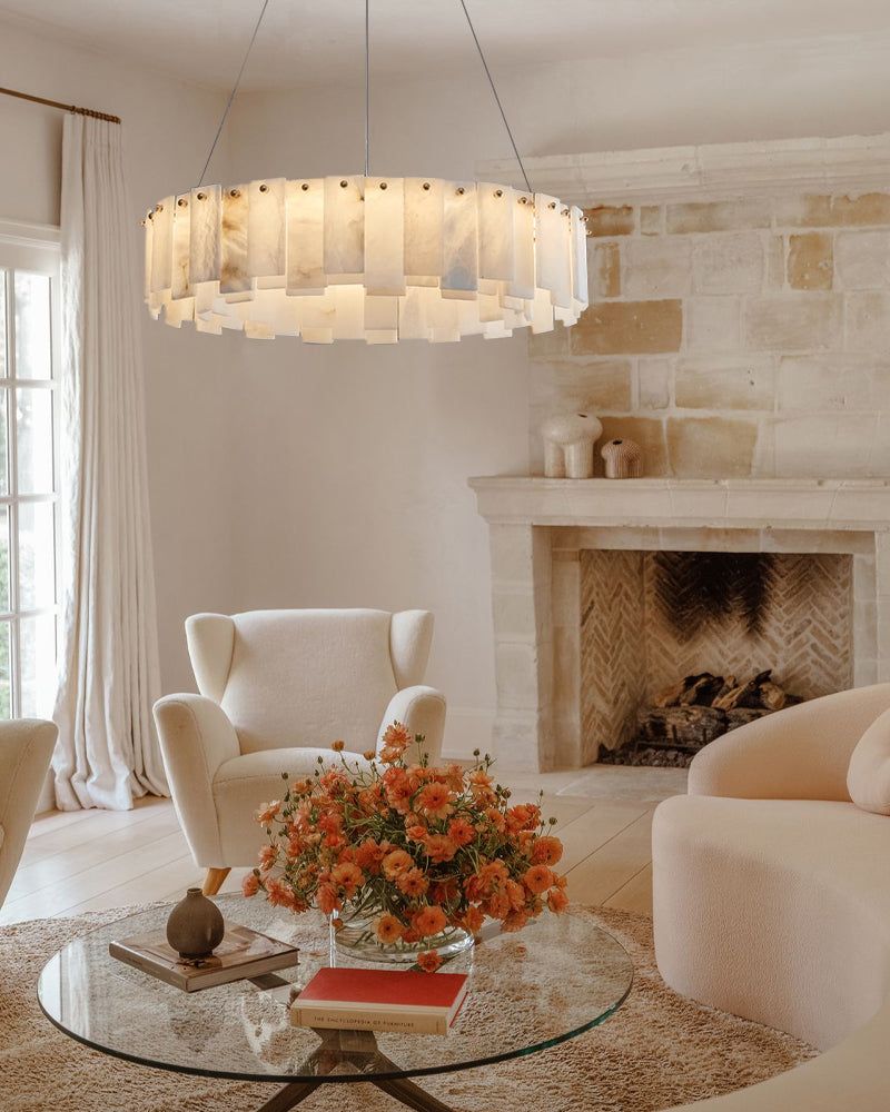 White marble ceiling light over a chic bedroom with modern wooden 