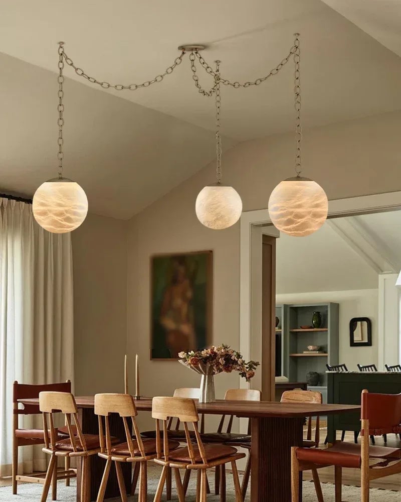 LightsStory Series Ethereal Chandelier | Globe Hand-Carved Natural Alabaster, Brass and Black finish for Grand staircases, high ceilings, and modern entryways Modern Pendant lamp