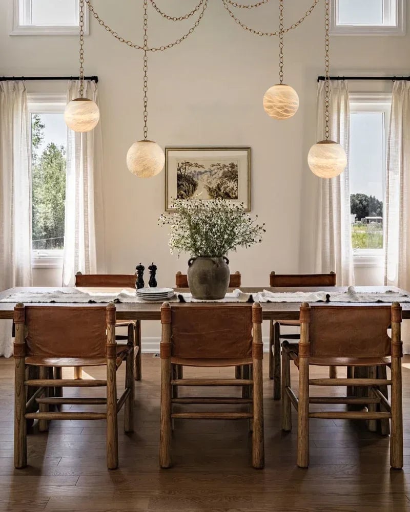 LightsStory Series Ethereal Chandelier | Globe Hand-Carved Natural Alabaster, Brass and Black finish for Grand staircases, high ceilings, and modern entryways Modern Pendant lamp