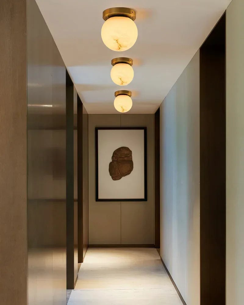 LightsStory Series Geometric Ceiling Light | Alabaster Orb Genuine alabaster with soft veining and polished brass frame, Polished Brass finish for Entryways, bedrooms, and living rooms Flush Mounted Ceiling Lamp